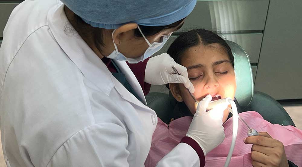 dental-camp-punjab-child-and-dentist.jpg