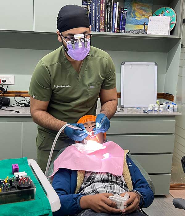 dental-camp-singh-child-with-dentist.jpg