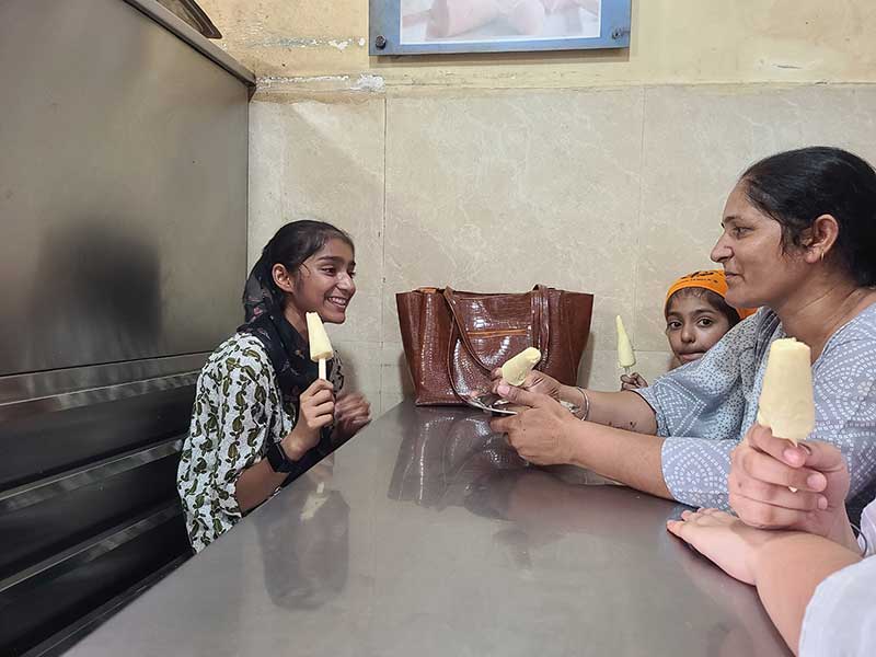 Child enjoying her first visit to Sri Amritsar Sahib
